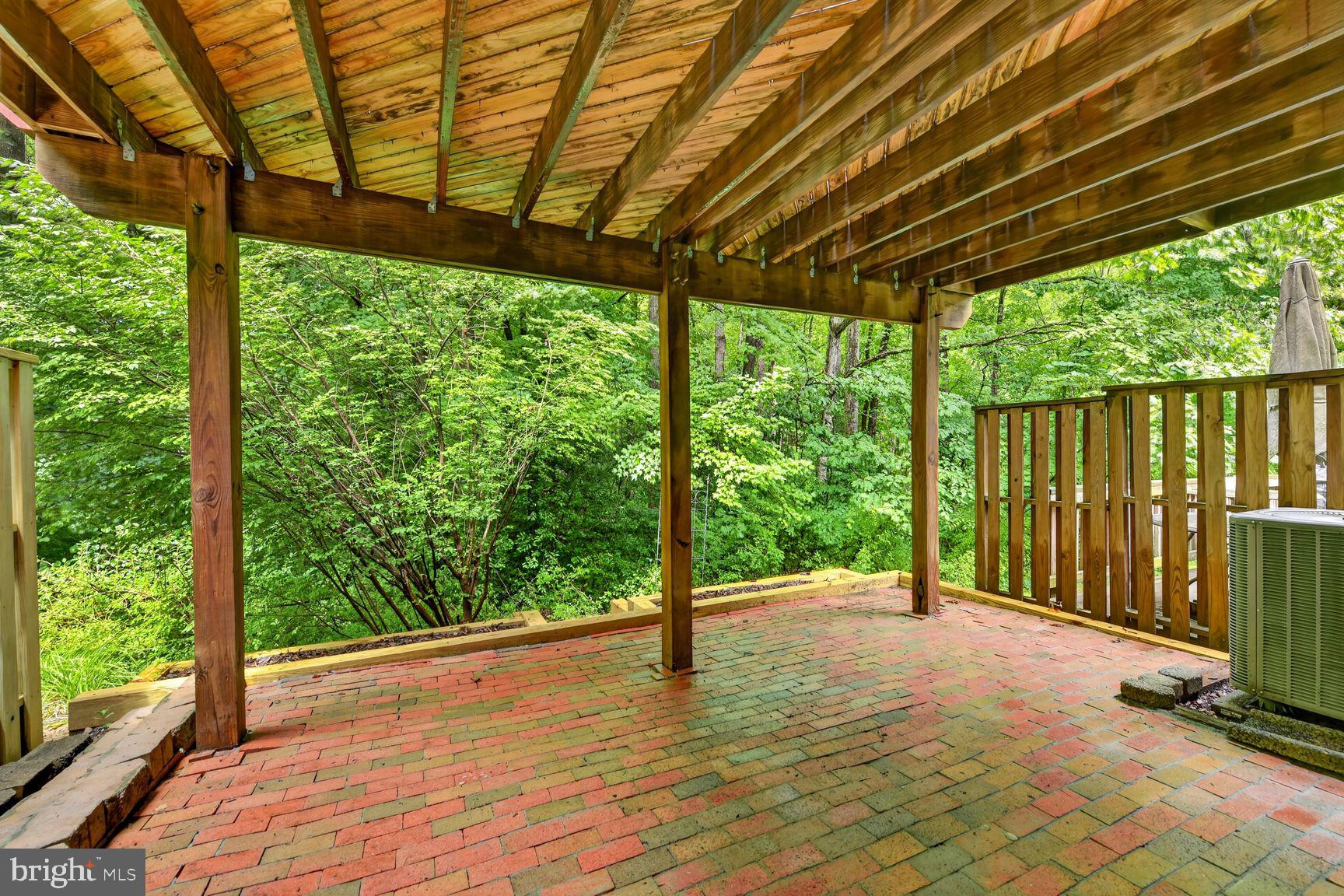 10902 Harpers Square Court Reston, VA 20191 - Photo 29 of 34 Brick patio off of basement