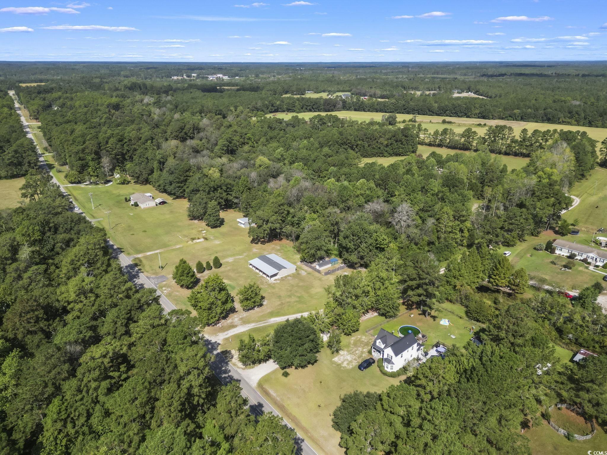 1585 Daisy Road Loris, SC 29569 - Photo 10 of 48 View of property location with a heavily wooded area