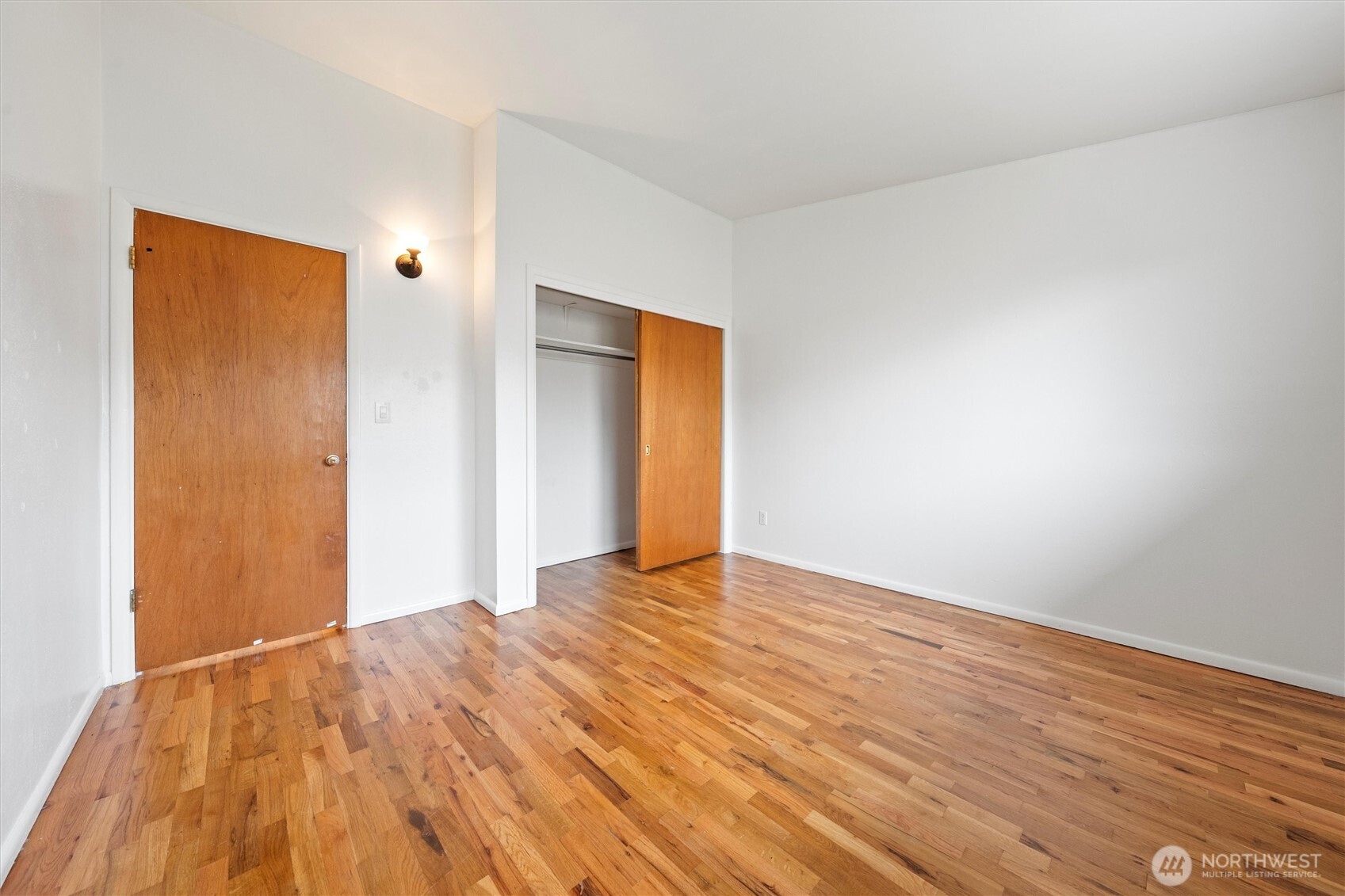 401 Statter Road Ephrata, WA 98823 - Photo 11 of 40 a view of empty room with wooden floor