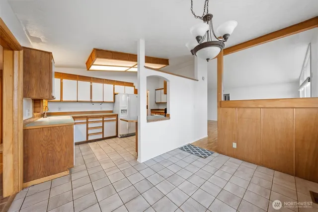 a view of a kitchen with a sink