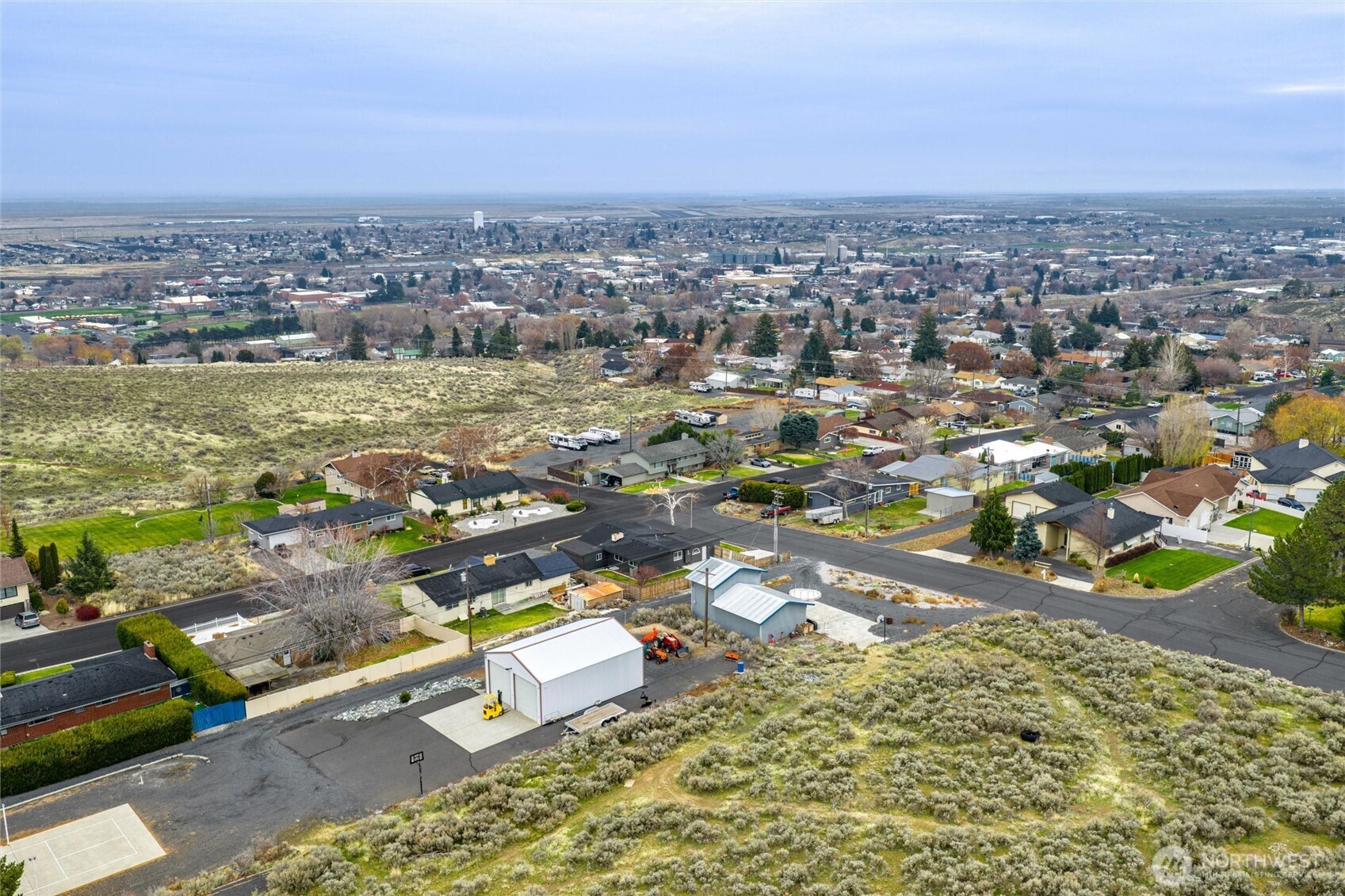 401 Statter Road Ephrata, WA 98823 - Photo 3 of 40 an aerial view of residential houses with outdoor space