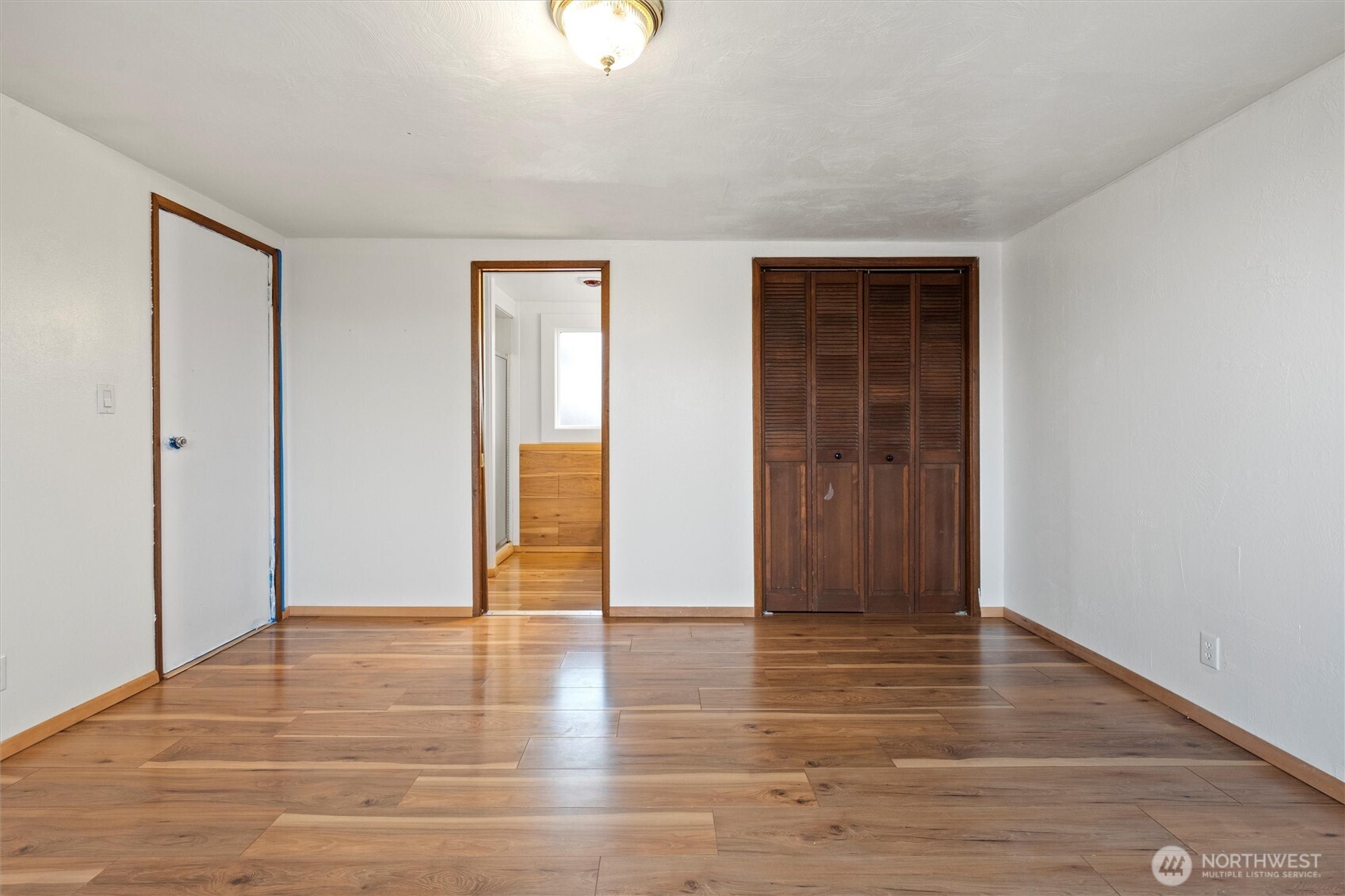 401 Statter Road Ephrata, WA 98823 - Photo 33 of 40 a view of an empty room with wooden floor