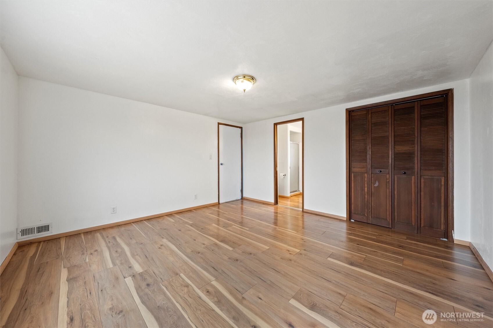 401 Statter Road Ephrata, WA 98823 - Photo 34 of 40 a view of an empty room with wooden floor
