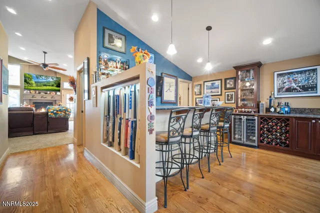 a view of a entryway with furniture and wooden floor