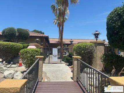 a view of balcony with furniture