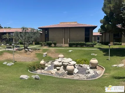 a swimming pool with wooden fence