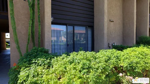 a view of a backyard of the house