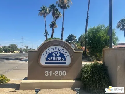 a sign broad on the side of the road