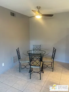 a view of a room with table and chair