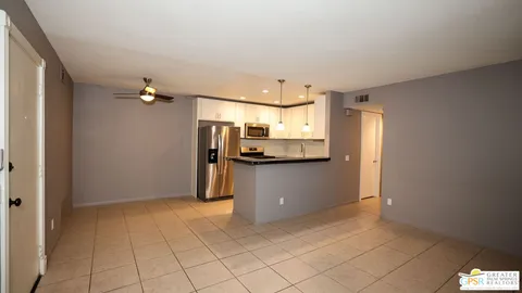 a view of a kitchen with a sink