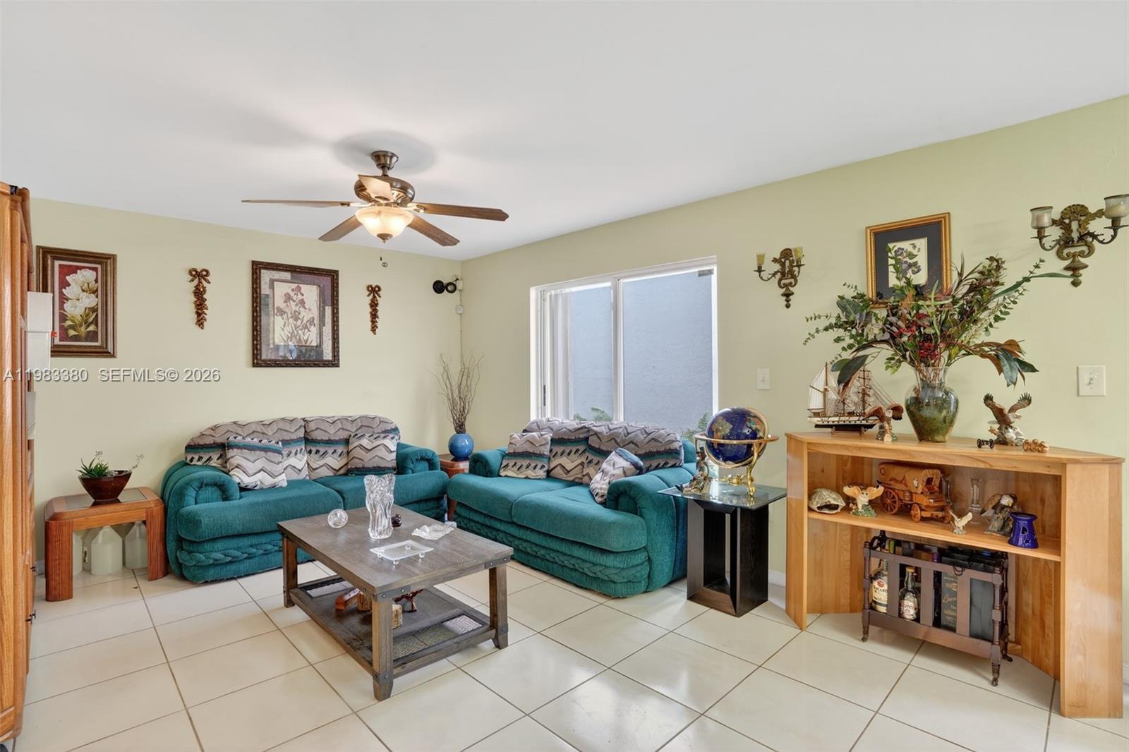 15672 Southwest 91st Lane Miami, FL 33196 - Photo 11 of 47 a living room with furniture and wooden floor