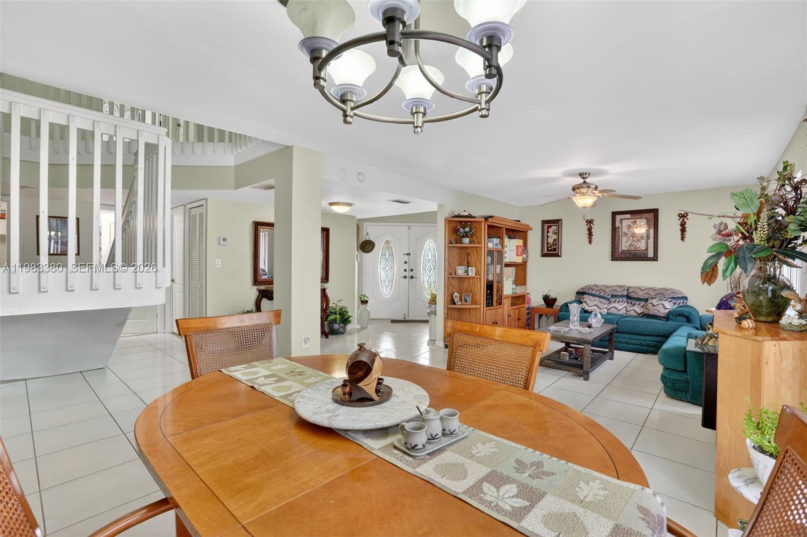 15672 Southwest 91st Lane Miami, FL 33196 - Photo 14 of 47 a living room with furniture and wooden floor