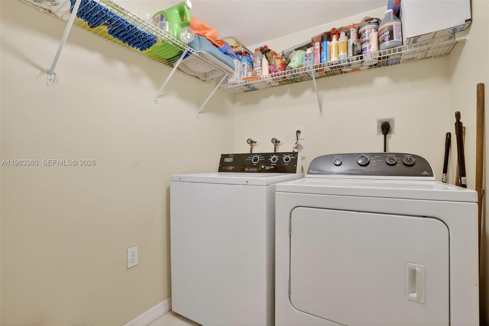 15672 Southwest 91st Lane Miami, FL 33196 - Photo 21 of 47 a utility room with dryer and washer