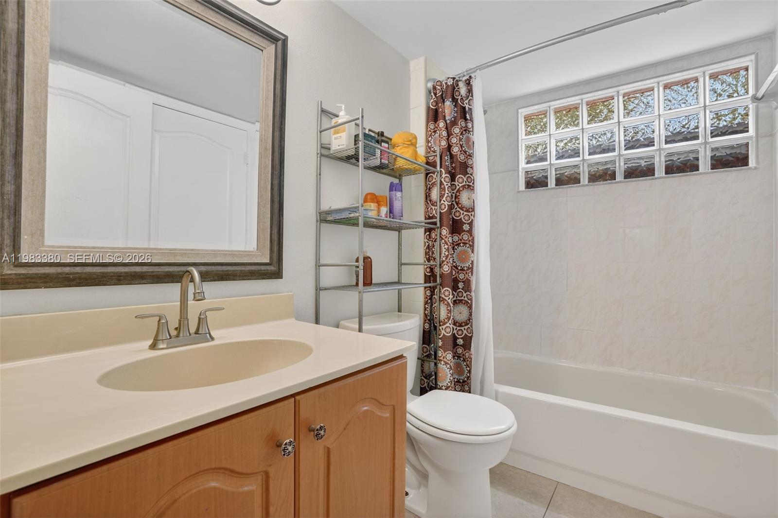15672 Southwest 91st Lane Miami, FL 33196 - Photo 22 of 47 a bathroom with a sink toilet and shower
