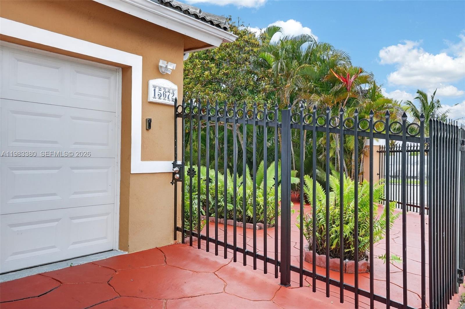 15672 Southwest 91st Lane Miami, FL 33196 - Photo 5 of 47 a view of a backyard