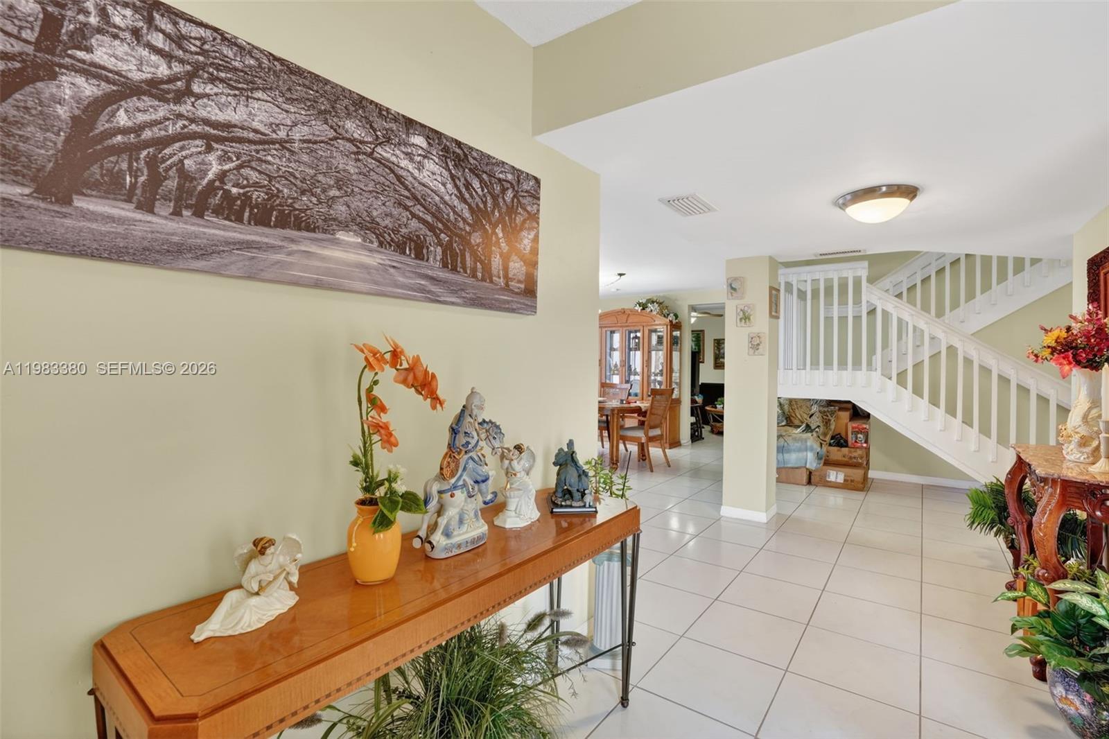 15672 Southwest 91st Lane Miami, FL 33196 - Photo 9 of 47 a living room with furniture