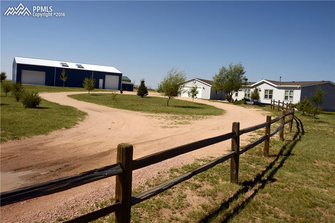 1048 Buffalo Run Road Calhan, CO 80808 - Photo 1 of 36 Gallery Image 1