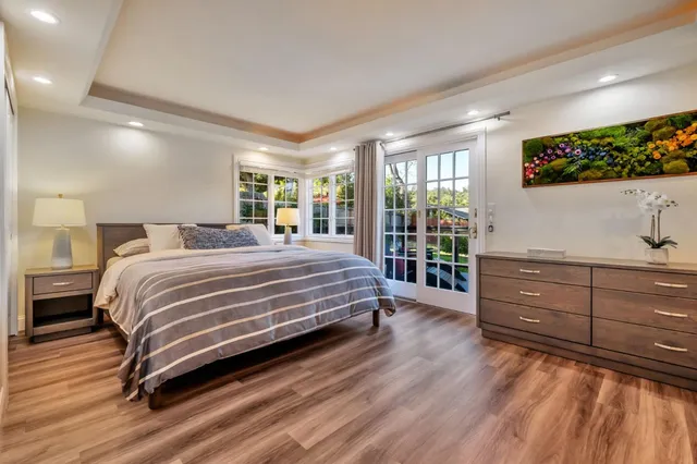 a view of a swimming pool with a yard