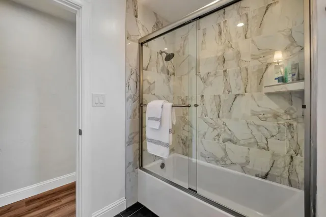 a view of a house with a yard and garage