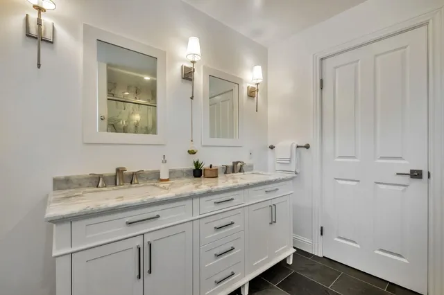 an aerial view of a house with a yard swimming pool outdoor seating and yard