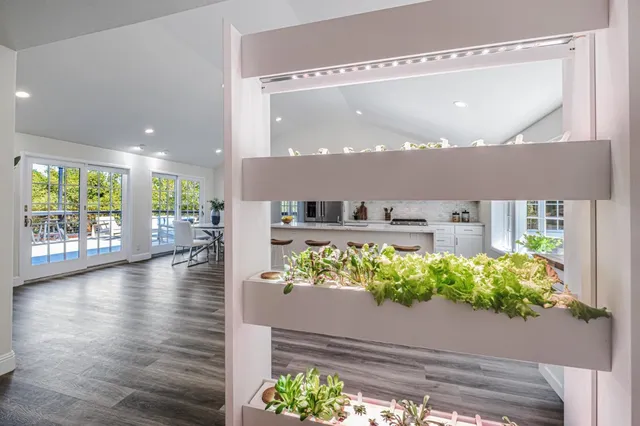 a bathroom with a granite countertop sink mirror and vanity