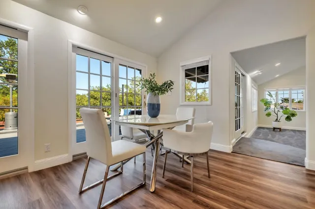 a bathroom with a granite countertop sink mirror and double