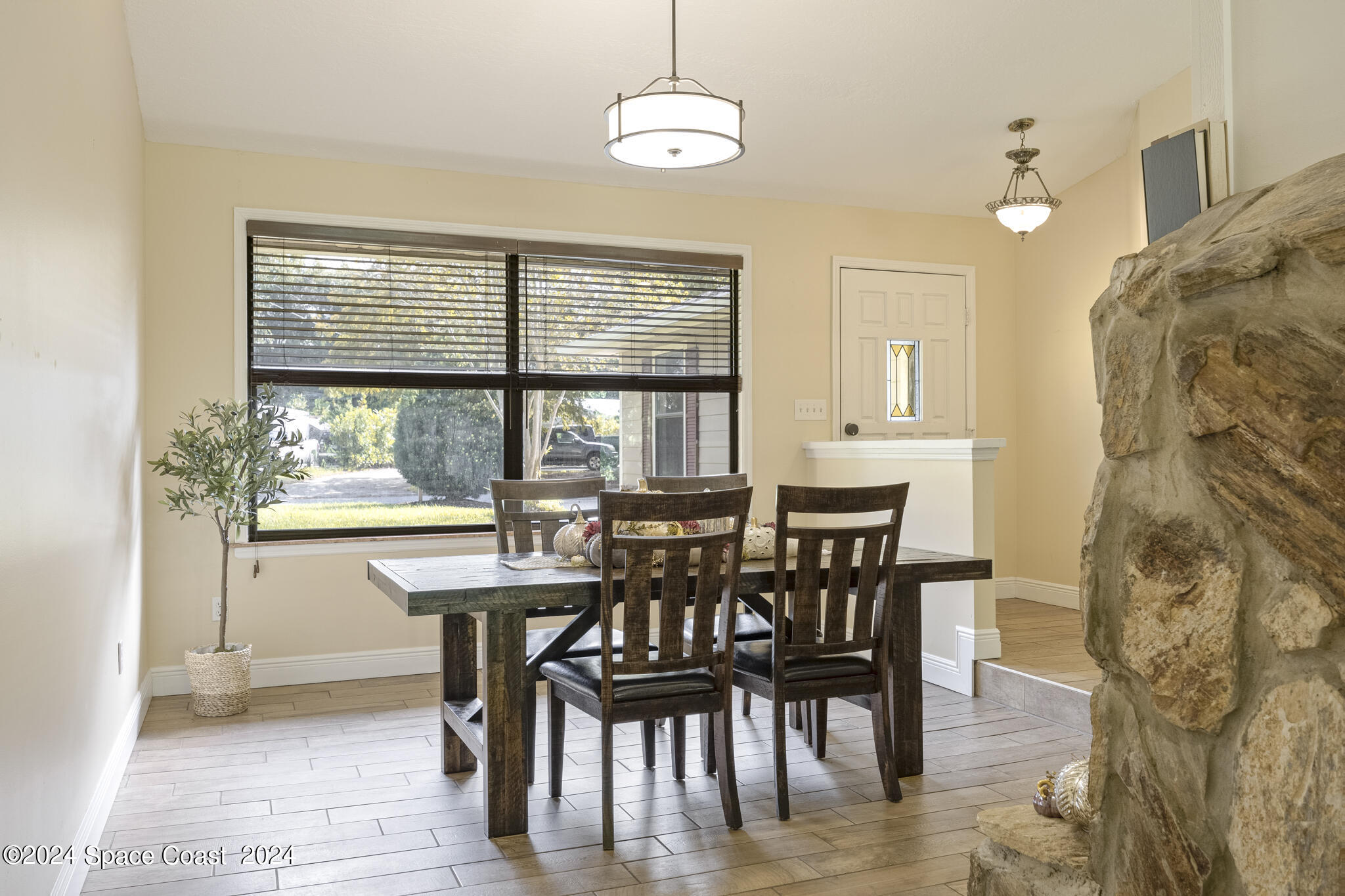 3725 Laurette Road Merritt Island, FL 32952 - Photo 13 of 46 a view of a dining room with furniture window and outside view