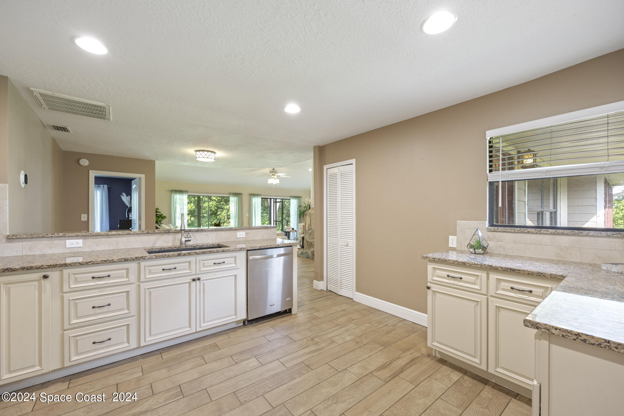 3725 Laurette Road Merritt Island, FL 32952 - Photo 15 of 46 a large bathroom with a sink and a mirror