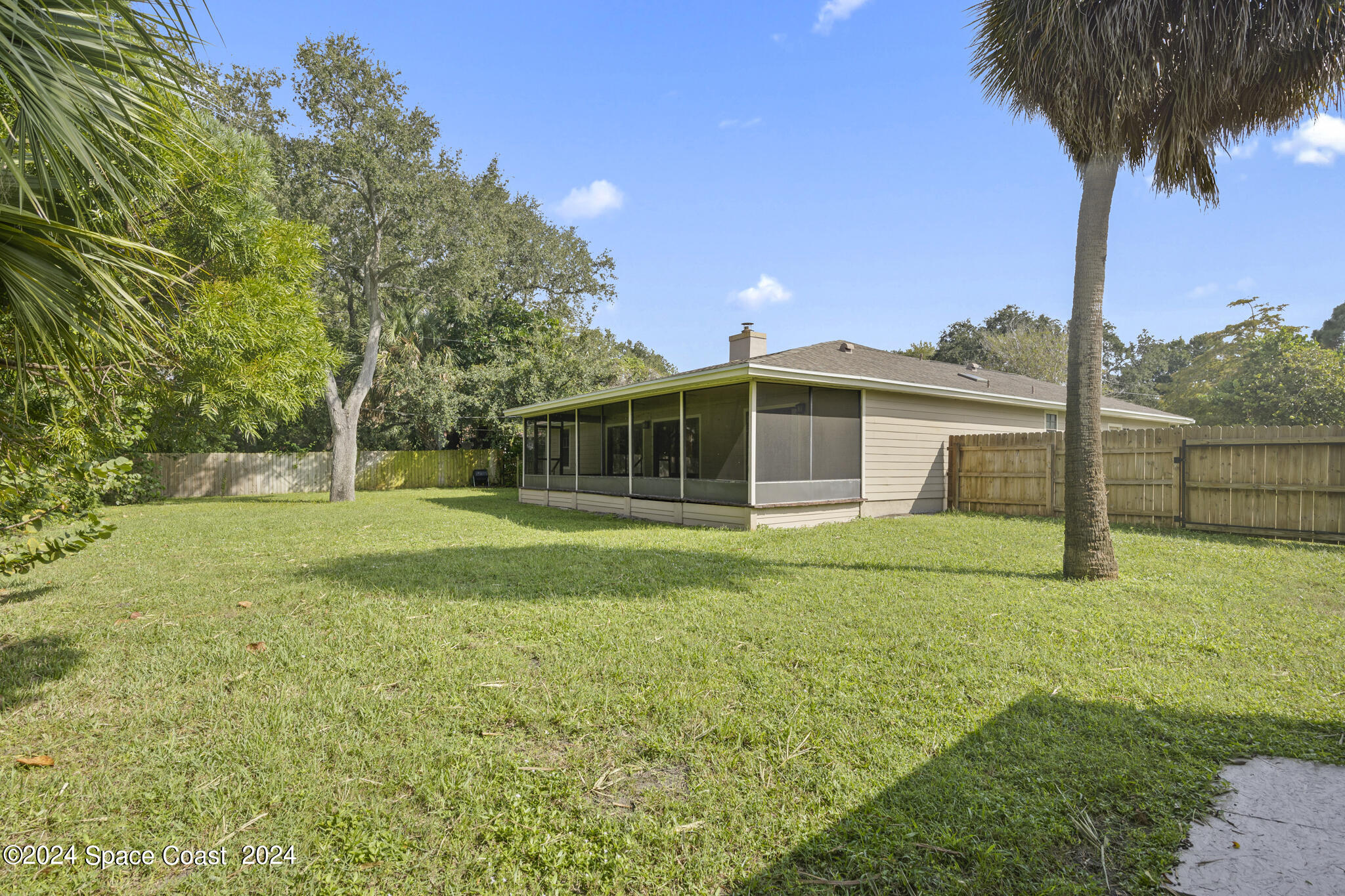 3725 Laurette Road Merritt Island, FL 32952 - Photo 38 of 46 a view of an house with backyard space and balcony