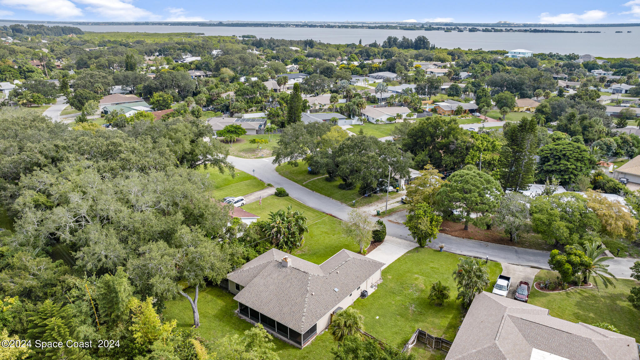 3725 Laurette Road Merritt Island, FL 32952 - Photo 44 of 46 an aerial view of a house with a yard