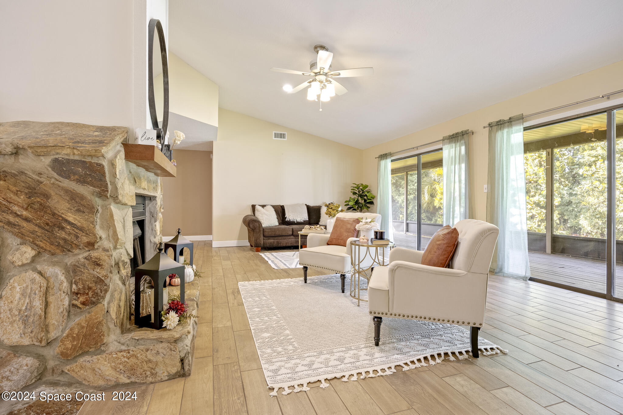 3725 Laurette Road Merritt Island, FL 32952 - Photo 8 of 46 a living room with furniture and wooden floor
