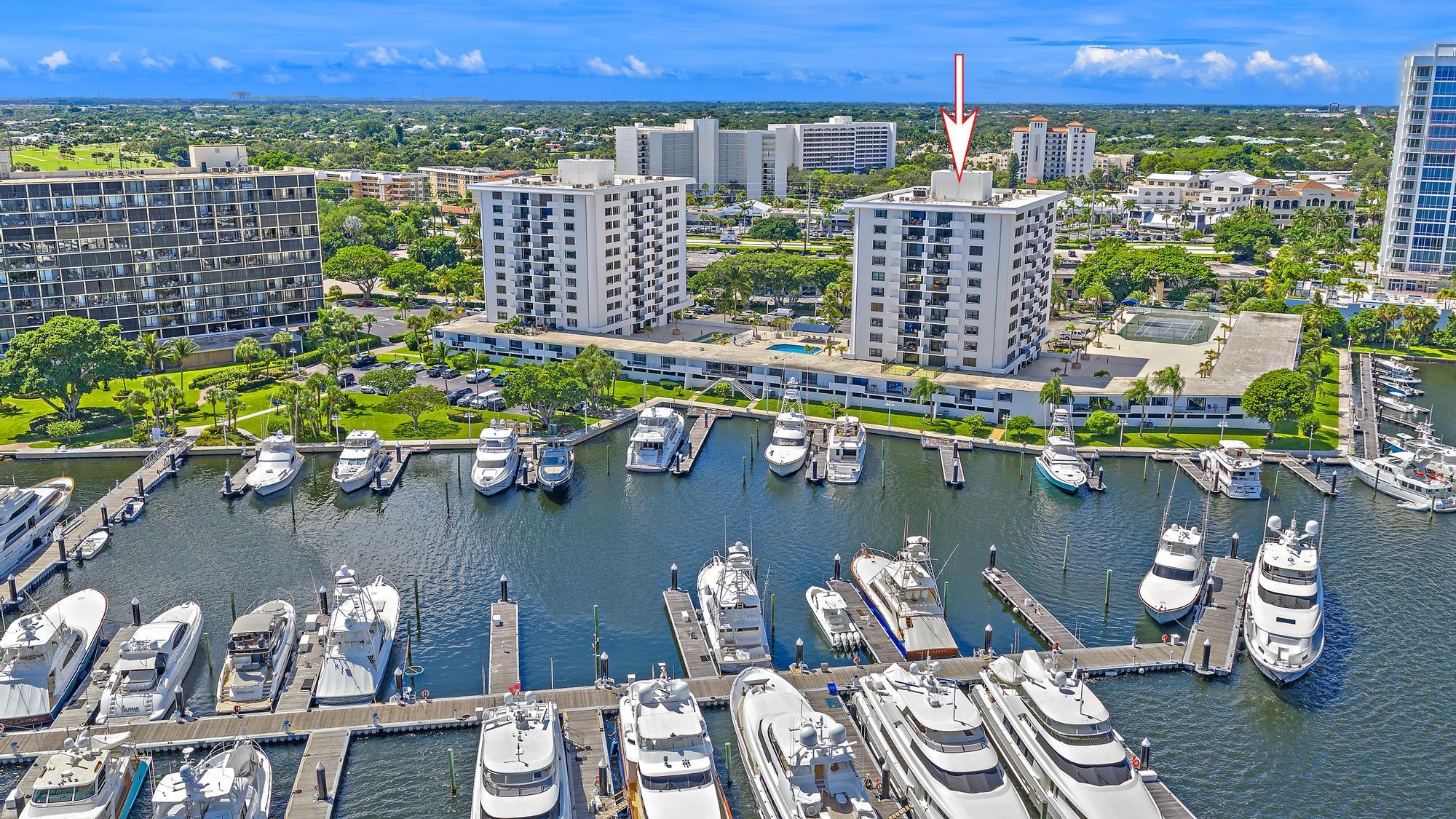 1208 Marine Way, Unit 105 North Palm Beach, FL 33408 - Photo 22 of 22 a balcony with chairs and a table