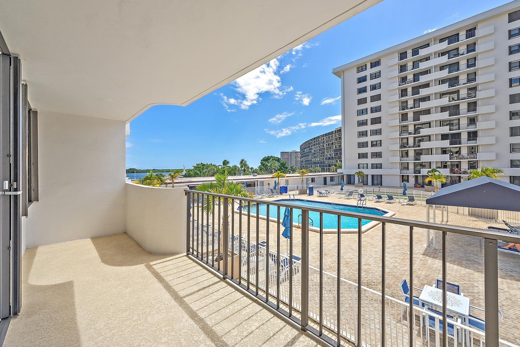 1208 Marine Way, Unit 105 North Palm Beach, FL 33408 - Photo 7 of 22 a view of balcony with furniture