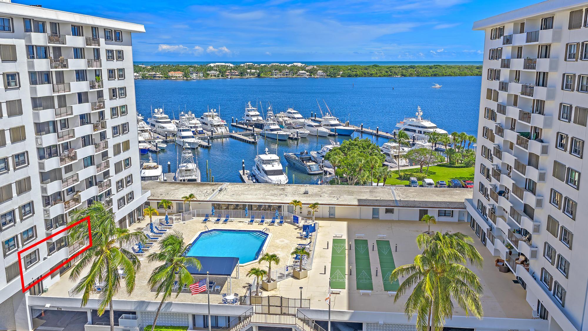 1208 Marine Way, Unit 105 North Palm Beach, FL 33408 - Photo 9 of 22 a view of swimming pool with outdoor seating and city view