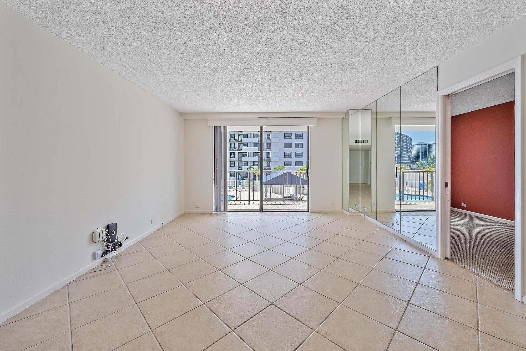 1208 Marine Way, Unit 105 North Palm Beach, FL 33408 - Photo 10 of 22 a view of an empty room with a window