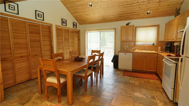 a view of a dining room with furniture