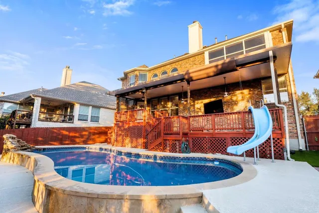 a front view of house with outdoor seating