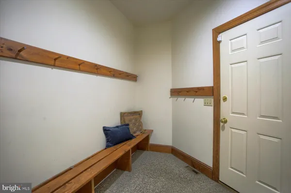 a bathroom with double sink and a mirror