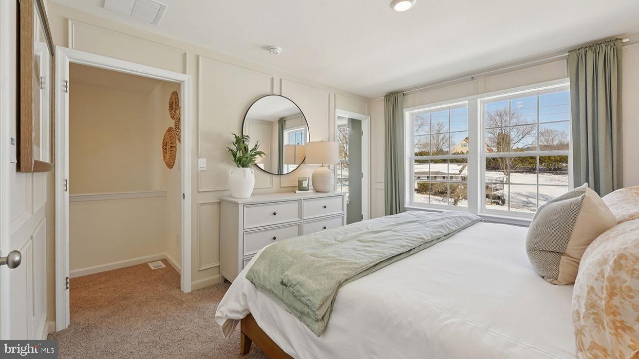 578 Swamp Creek Road Boyertown, PA 19512 - Photo 19 of 26 a spacious bedroom with a bed and a dresser