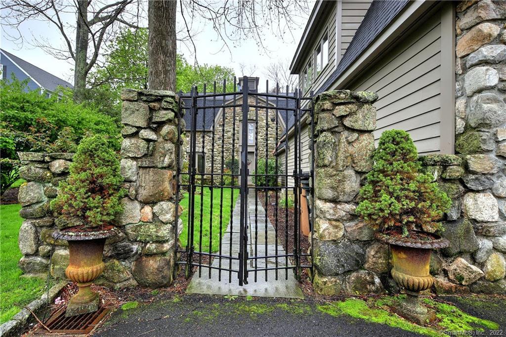 30 Fieldstone Road Stamford, CT 06902 - Photo 1 of 1 a view of a backyard with plants