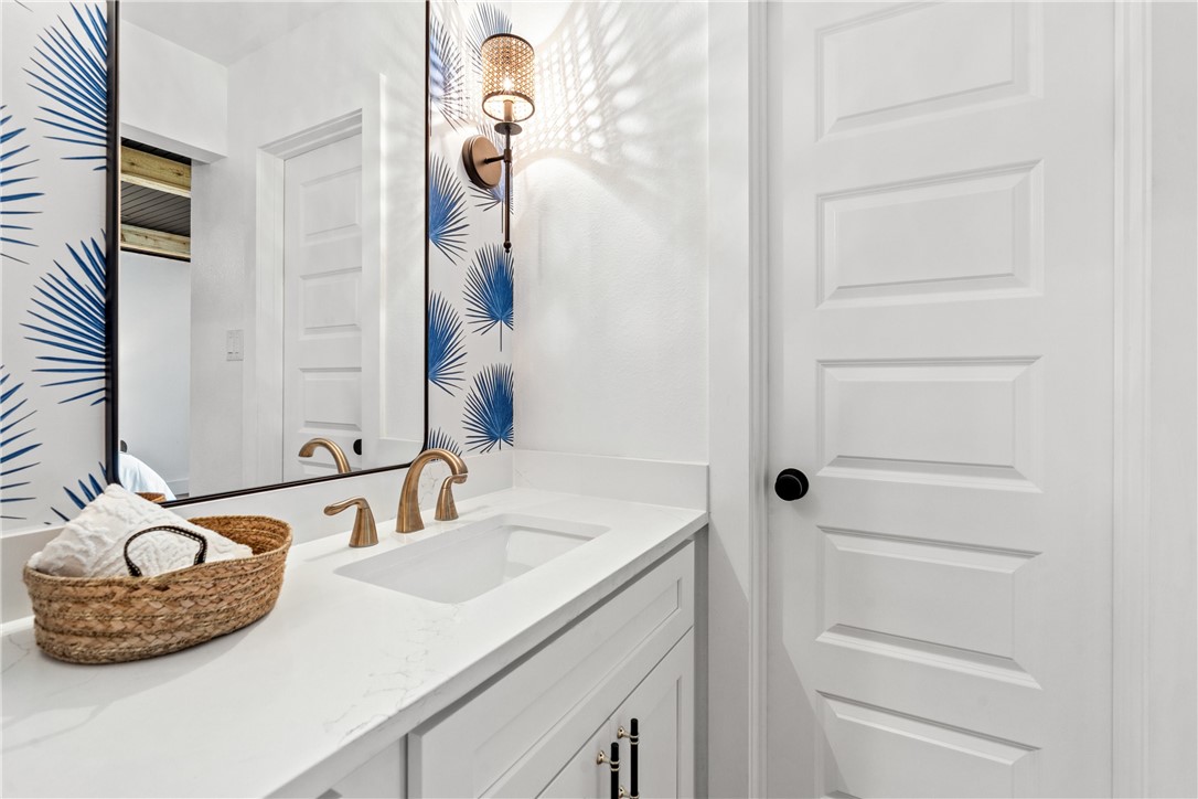 3808 Leafield Drive Austin, TX 78749 - Photo 19 of 31 a bathroom with a sink and a mirror