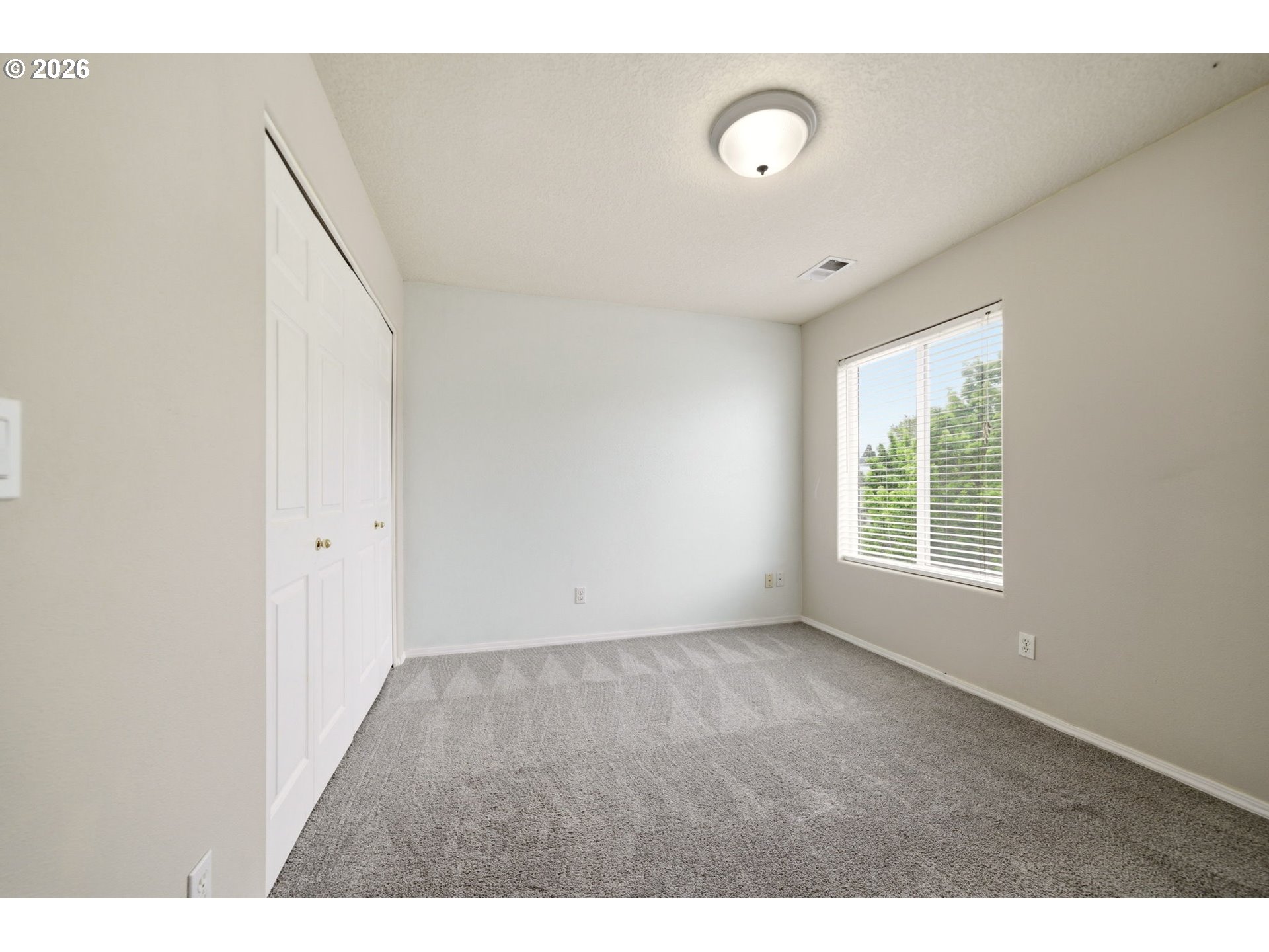 1448 Southwest 208th Avenue Beaverton, OR 97003 - Photo 34 of 39 a view of an empty room with a window