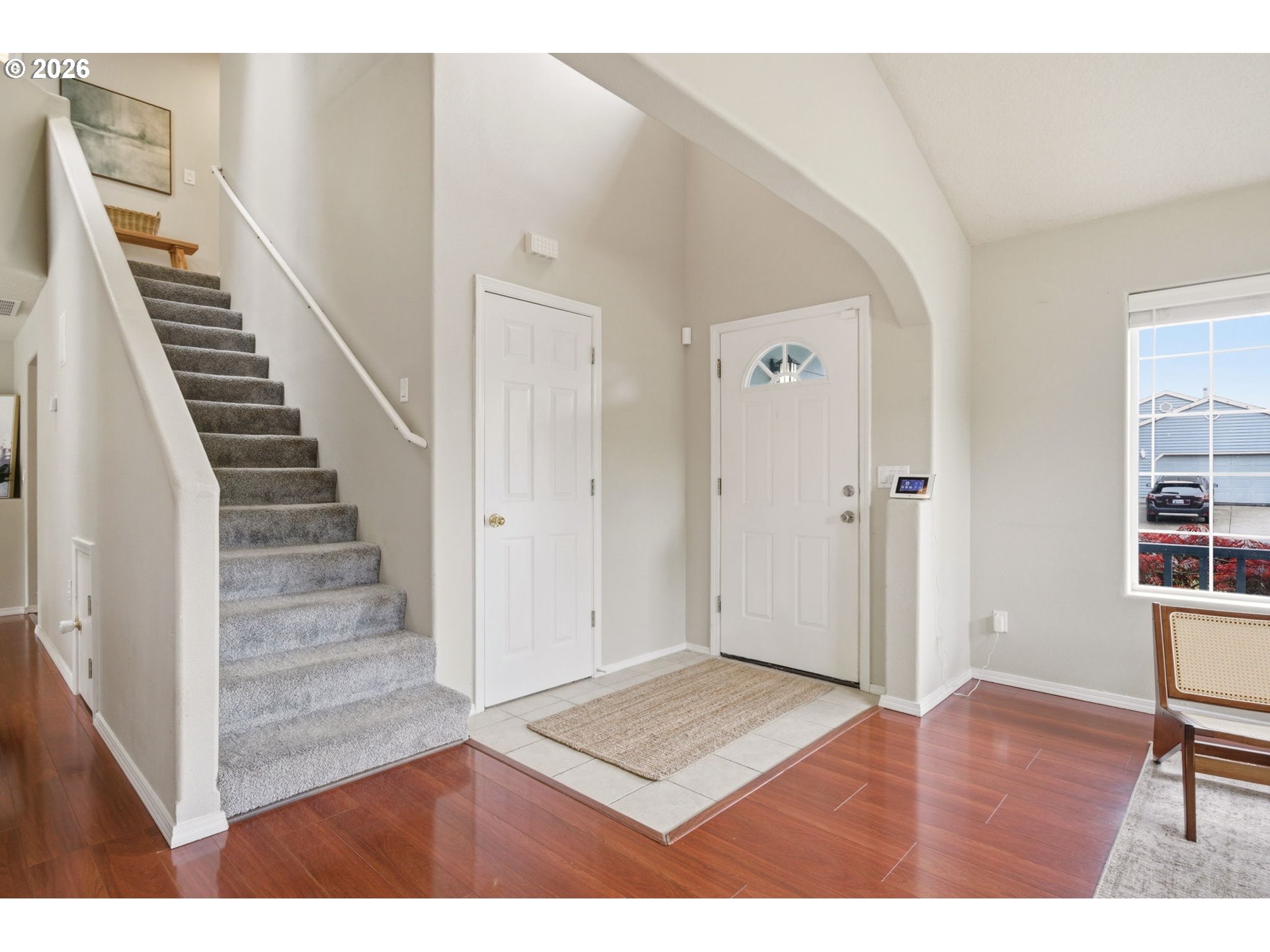 1448 Southwest 208th Avenue Beaverton, OR 97003 - Photo 4 of 39 a view of an entryway with wooden floor