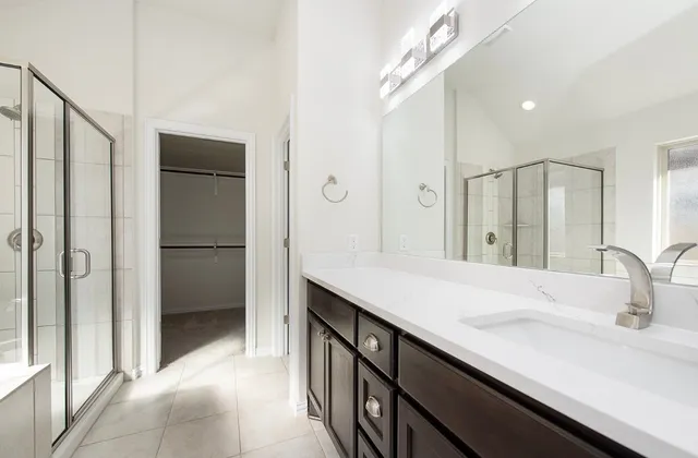 a view of a livingroom with a ceiling fan and window