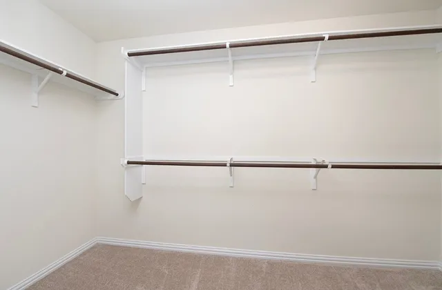 a bathroom with a tub and shower