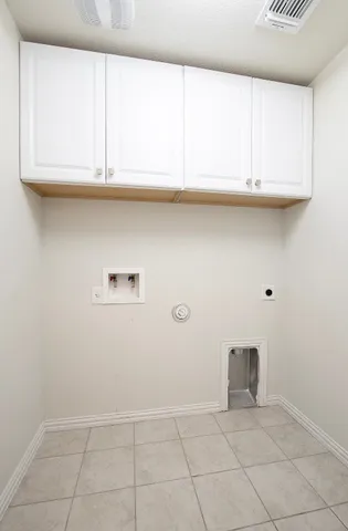 a kitchen with stainless steel appliances a refrigerator sink and microwave