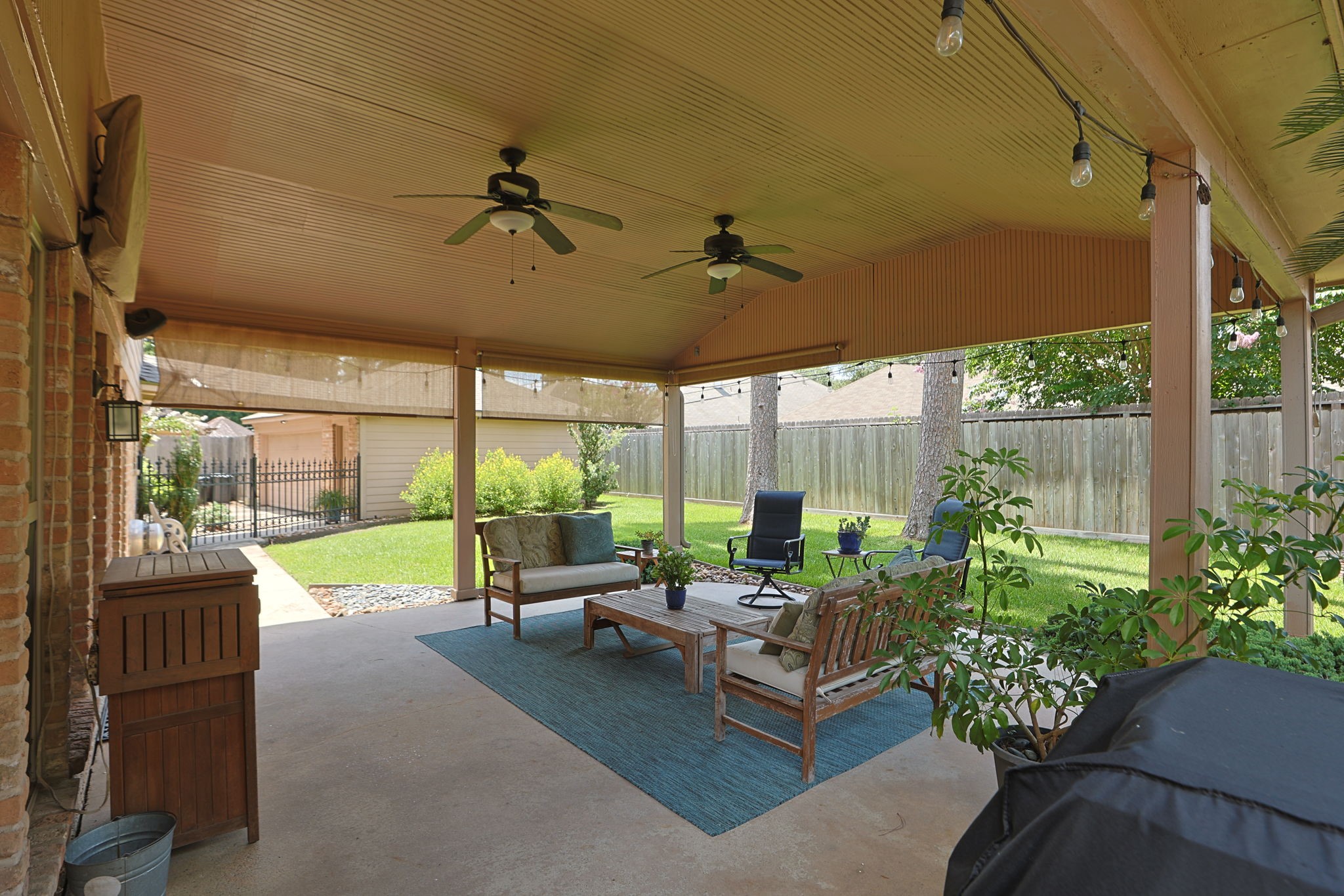3414 Flaming Candle Drive Spring, TX 77388 - Photo 40 of 50 COVERED PATIO - Very spacious and can accommodate plenty of outdoor furniture. Great place to relax or enjoy dinner outdoors.