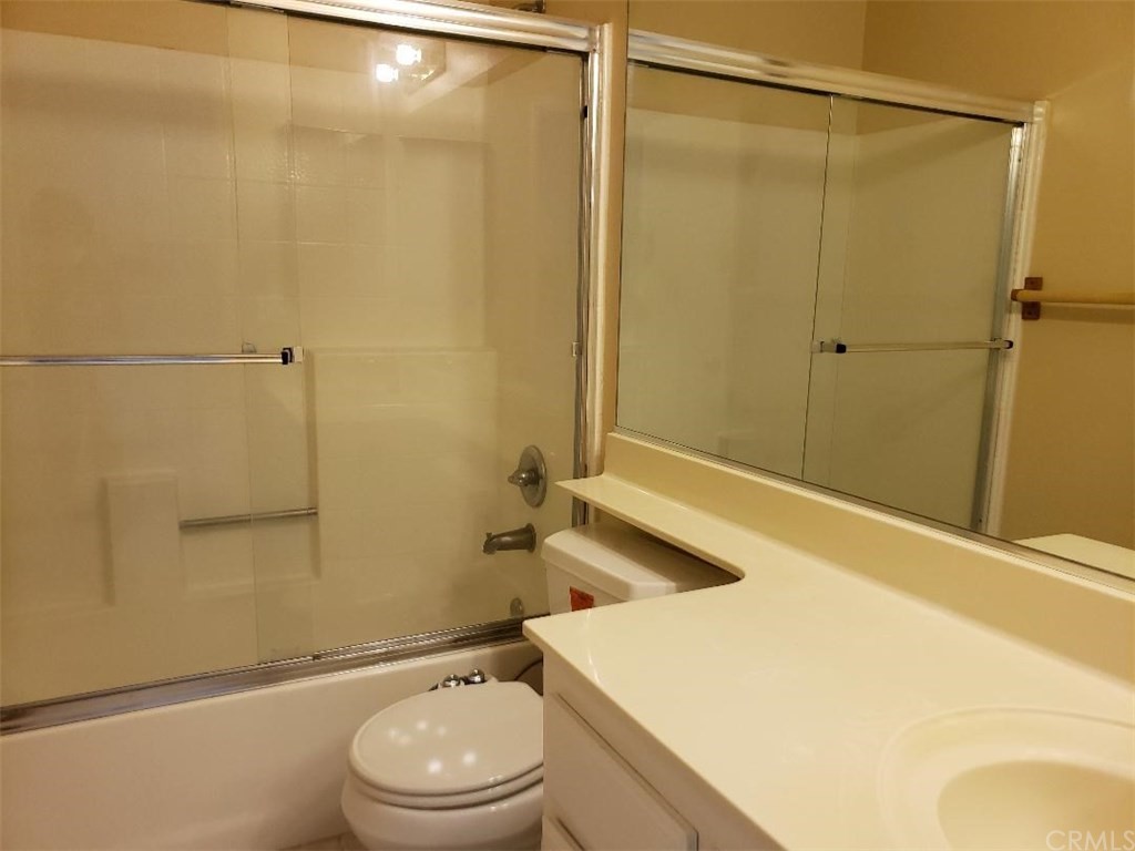 11445 Excelsior Drive Norwalk, CA 90650 - Photo 11 of 18 a bathroom with a sink a toilet and shower