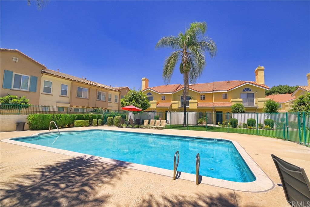 11445 Excelsior Drive Norwalk, CA 90650 - Photo 15 of 18 a view of an house with backyard and swimming pool