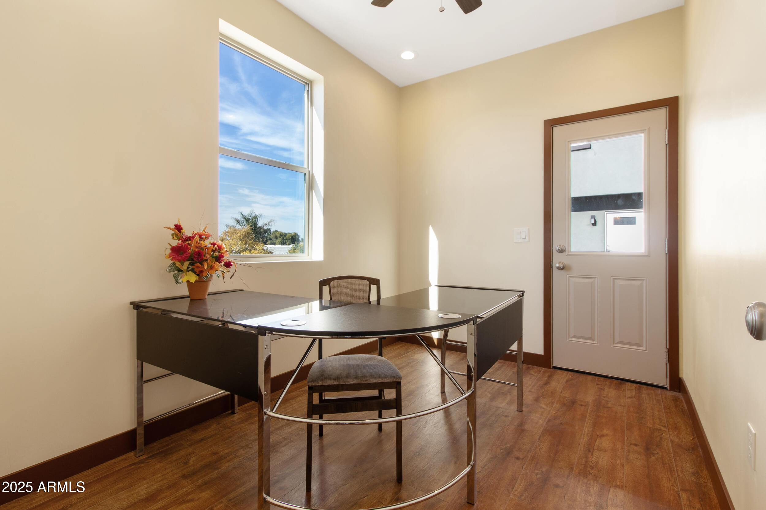 2014 West Lawrence Road Phoenix, AZ 85015 - Photo 14 of 24 a dining room with furniture and wooden floor
